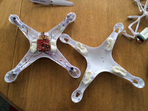 Adding styrofoam packing peanuts to help the Syma X5C-1 quadcopter float