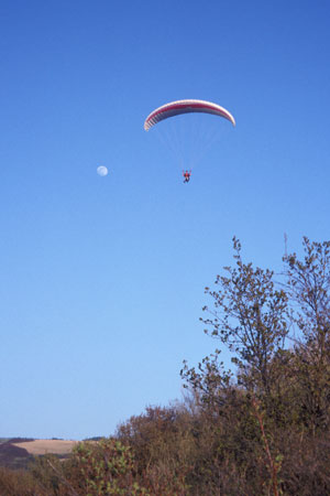 Paragliding with the moon